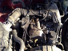 1998 TOYOTA TACOMA BURGUNDY STD CAB, 2.4L, MT 2WD.  Z24884